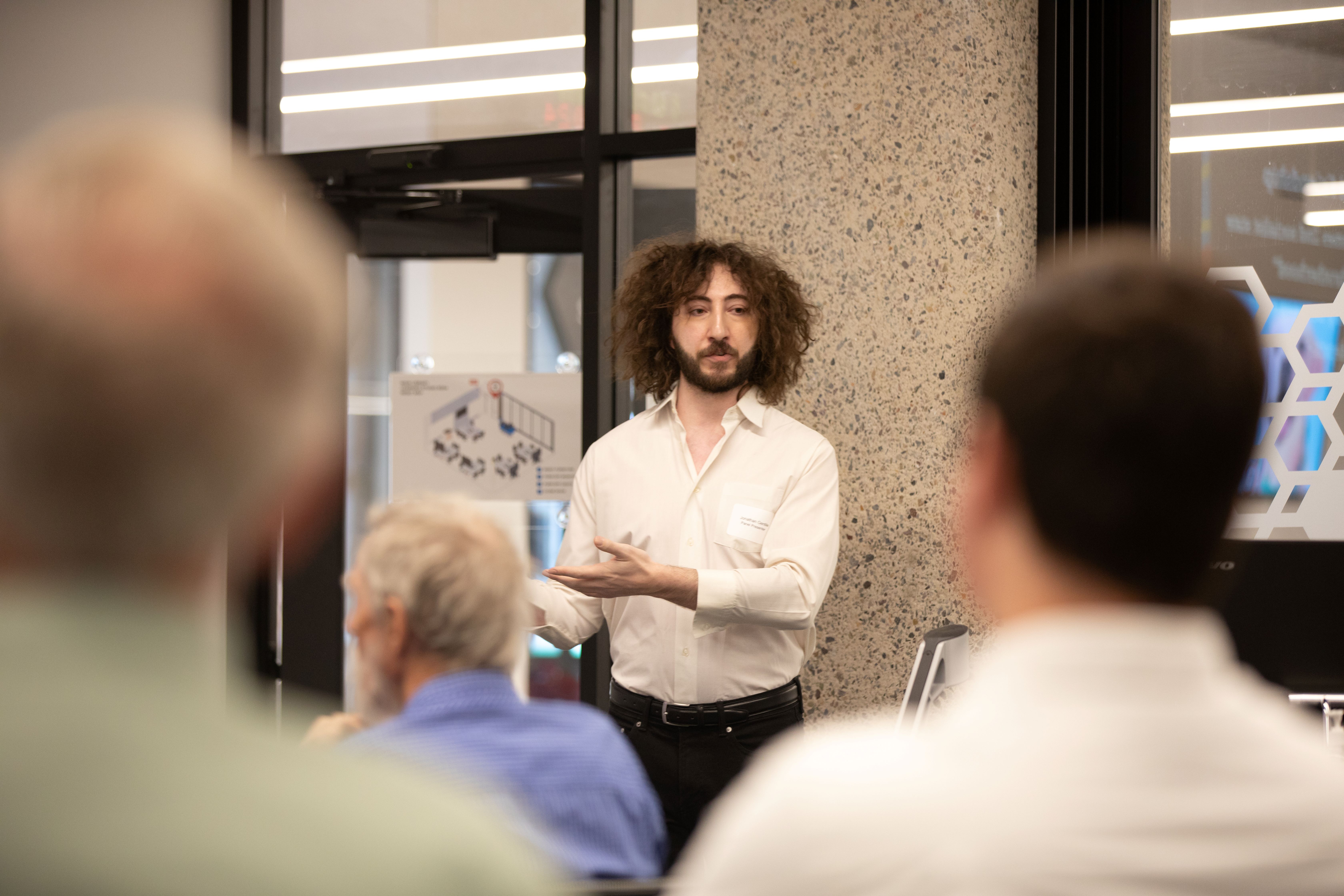 undergraduate student presenting in front of an audience