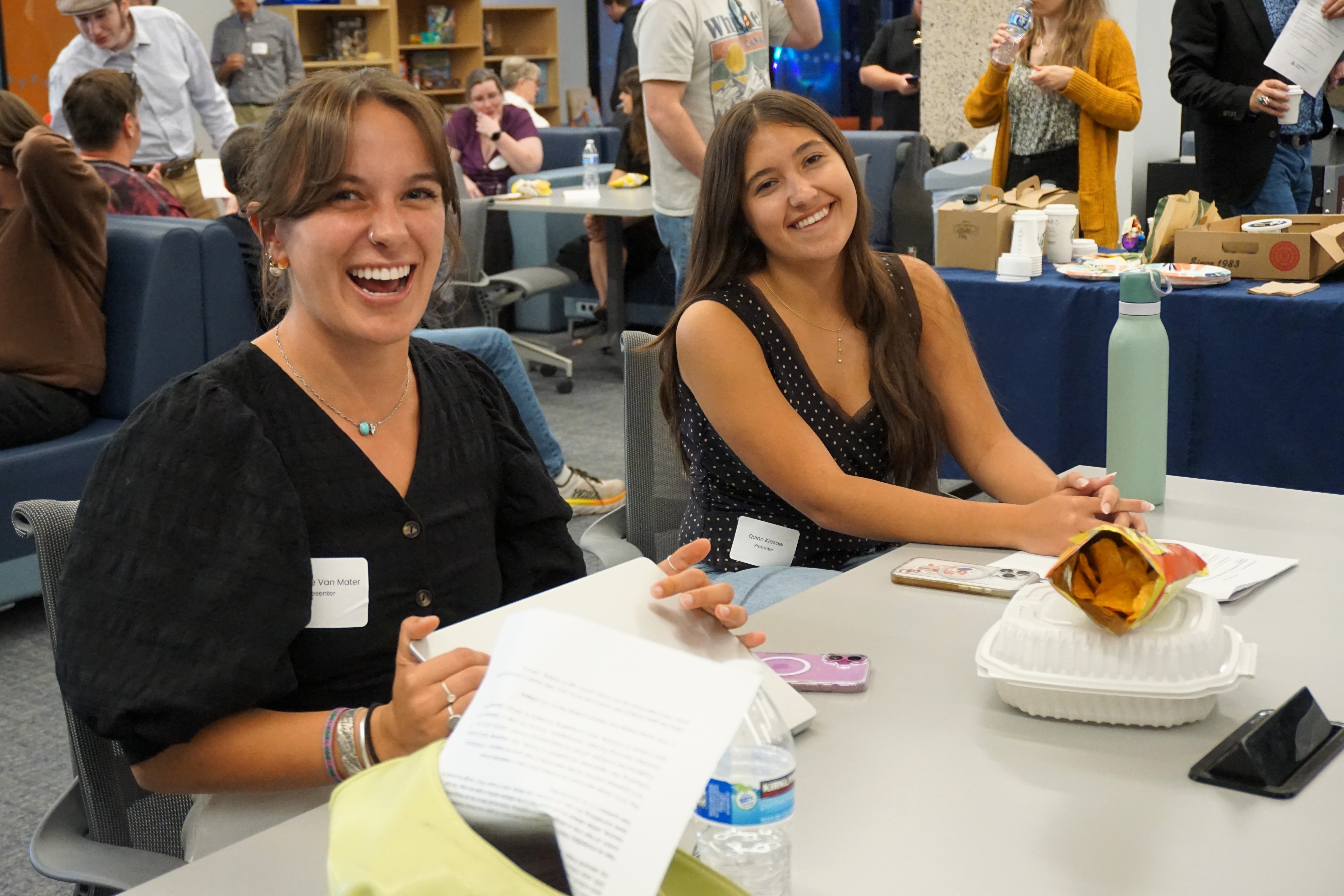 students smile at camera